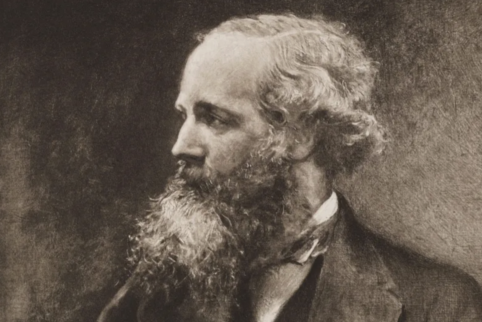 Sepia-toned portrait of a bearded man with curly hair, shown in profile, wearing a suit and bow tie, looking to the left with a serious expression.