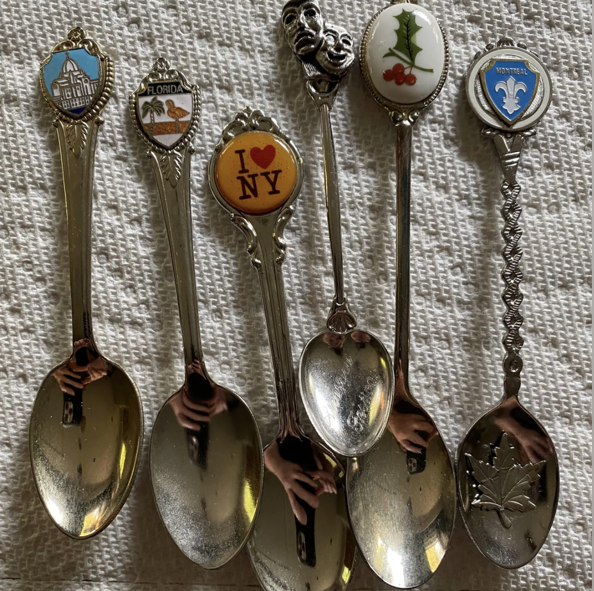 A group of spoons on a white cloth