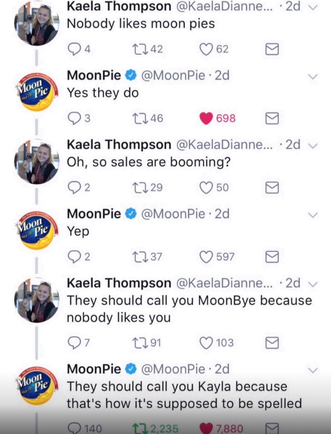A Twitter exchange where Kaela Thompson says "Nobody likes moon pies." MoonPie replies "Yes they do." Kaela asks if sales are booming; MoonPie answers "Yep." Kaela says "They should call you MoonBye," and MoonPie retorts, "They should call you Kayla because that’s how it’s supposed to be spelled.