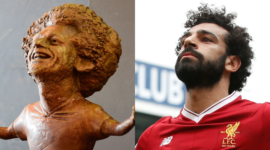 A split image showing a bronze statue with exaggerated features on the left and a soccer player in a red Liverpool jersey looking upwards on the right.