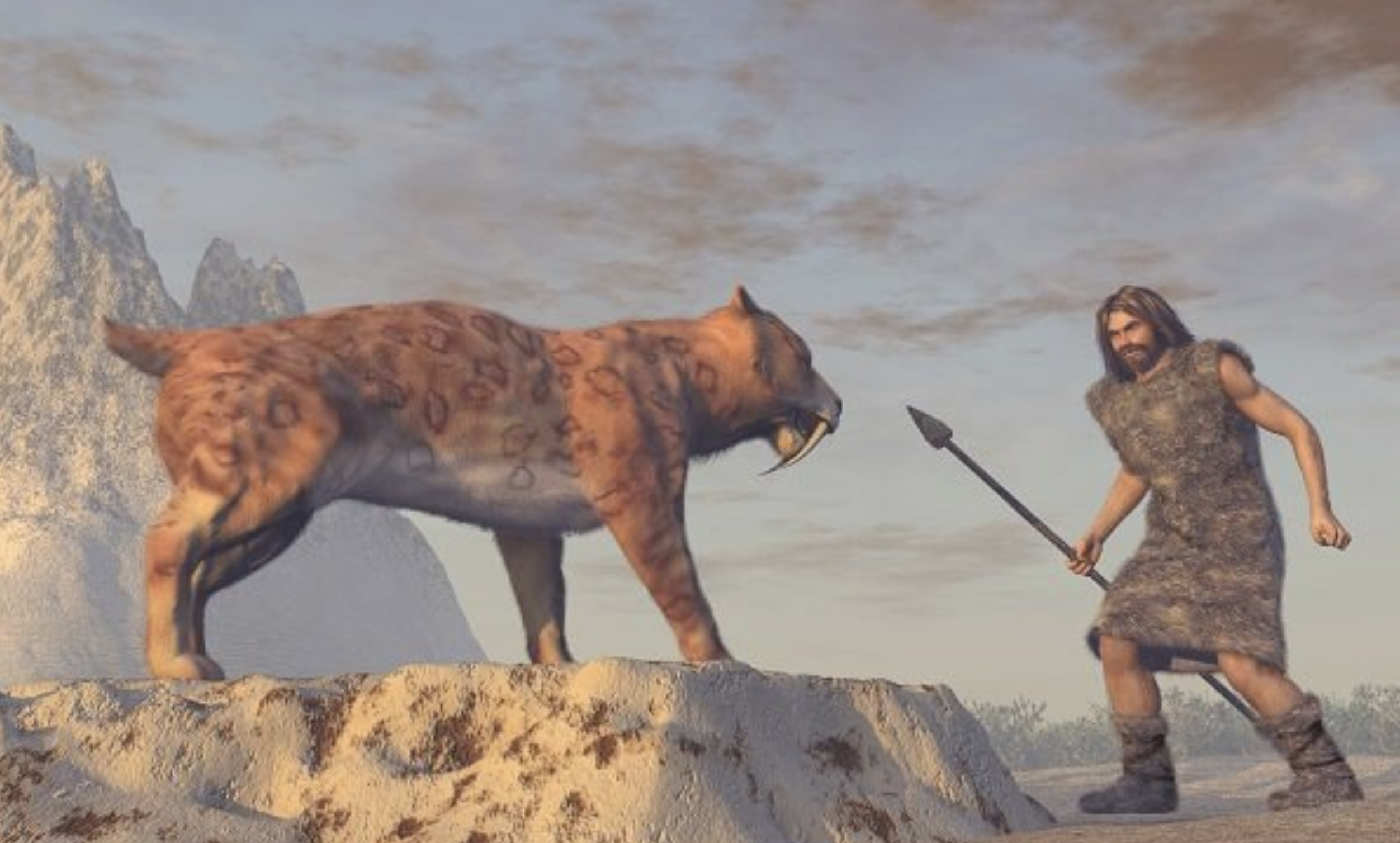 A prehistoric man in fur clothing holding a spear faces a large saber-toothed tiger on a rocky, snowy landscape with mountains and a cloudy sky in the background.