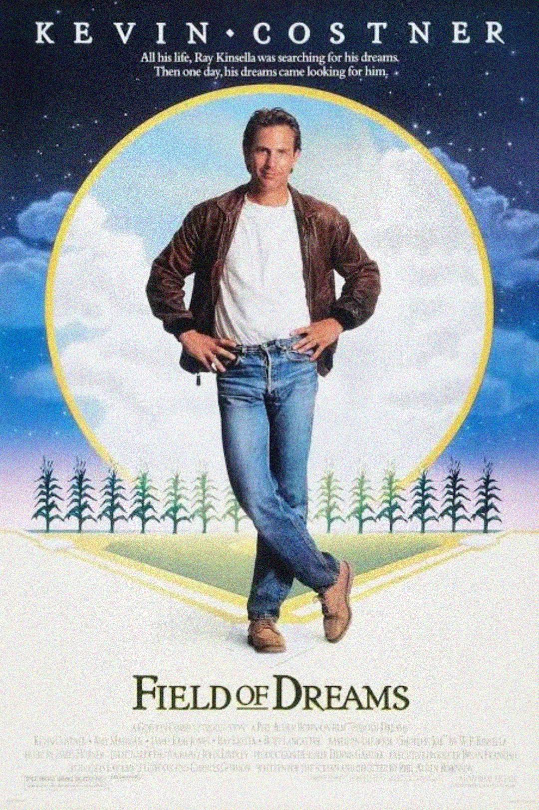 Movie poster for "Field of Dreams" showing a man in a leather jacket standing in front of a glowing baseball field and corn stalks, with the film title and "Kevin Costner" at the top.