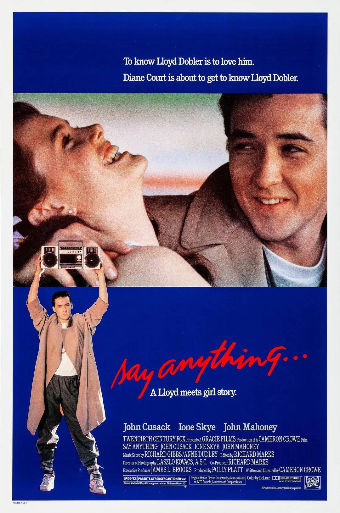 A movie poster for "Say Anything" shows a smiling young woman lying down next to a young man gazing at her. Below, a man in a trench coat holds a boombox over his head. The tagline reads, "A Lloyd meets girl story.