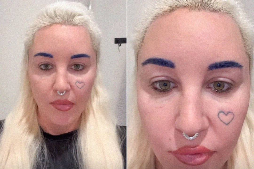 A person with long platinum blonde hair, blue eyebrows, a heart tattoo on their cheek, and a septum piercing is seen in two close-up photos. They have neutral facial expressions.