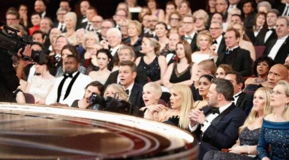 Audience at the Oscars ceremony listening to Oscars speeches