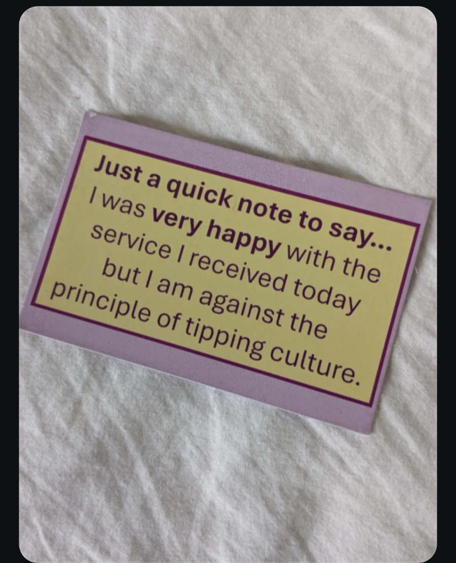 A card on white fabric reads: "Just a quick note to say... I was very happy with the service I received today but I am against the principle of tipping culture.