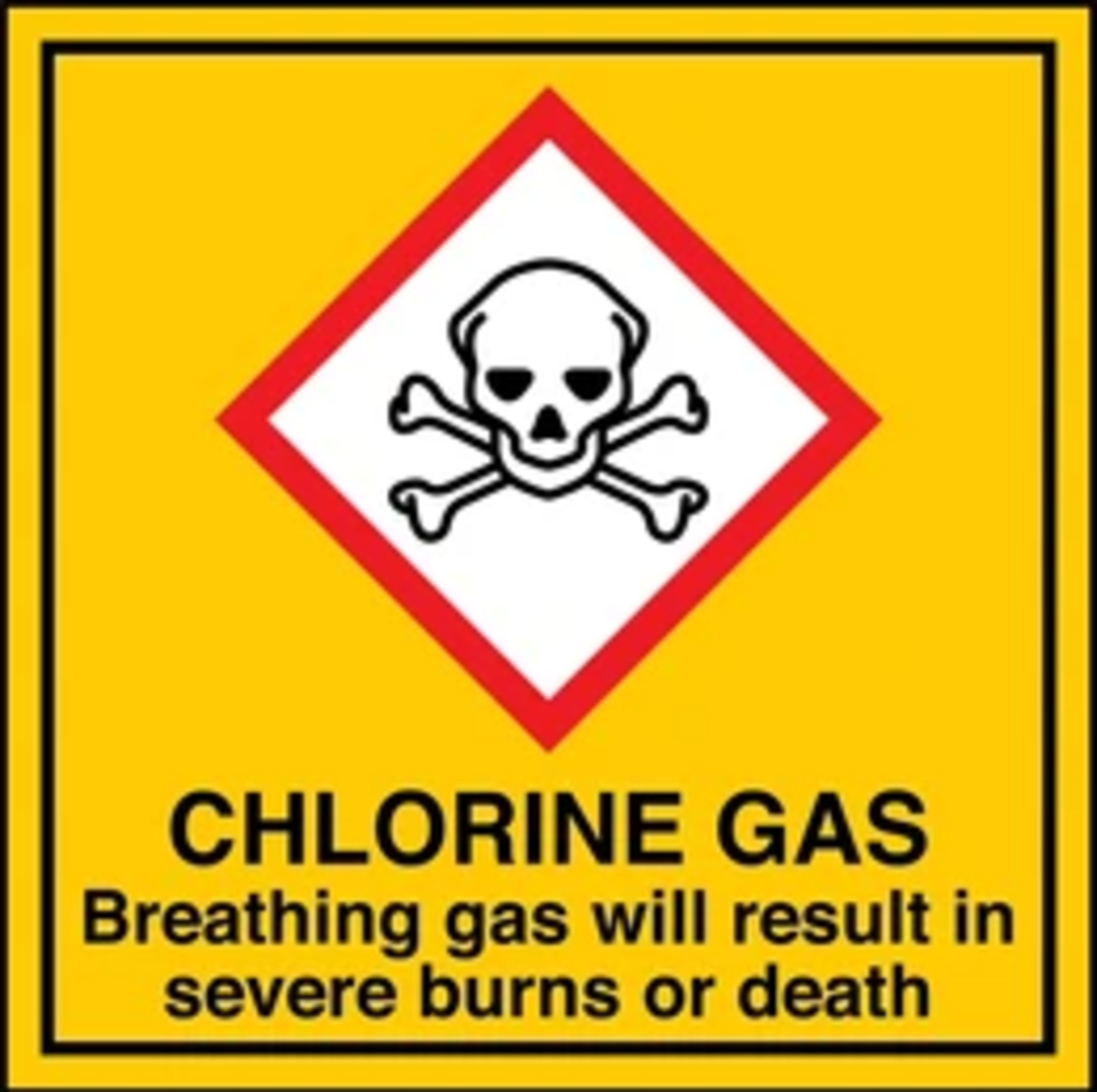 Warning sign with a skull and crossbones symbol. Text reads: “CHLORINE GAS. Breathing gas will result in severe burns or death.” Yellow background with a red diamond border around the symbol.