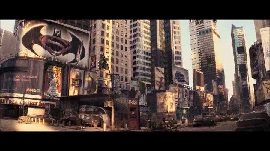 A deserted, sunlit cityscape with tall buildings and billboards, including a large Batman-Superman logo. The streets are empty and debris is scattered, giving a sense of abandonment and desolation.
