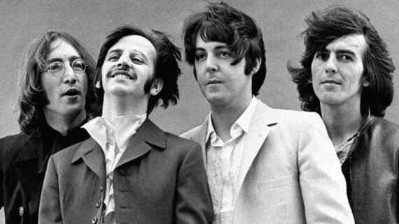 The Beatles posing together during their peak years