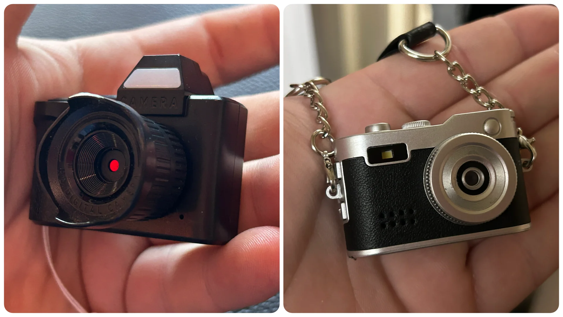 A hand holds two miniature camera models: the left is a black camera with a red dot on the lens, the right is a retro-style camera keychain with silver accents.
