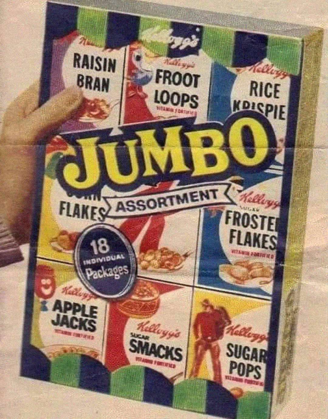 A hand holding a vintage Kellogg’s Jumbo Assortment box featuring 18 individual cereal packages, including Raisin Bran, Froot Loops, Rice Krispies, Corn Flakes, Frosted Flakes, Apple Jacks, Sugar Smacks, and Sugar Pops.