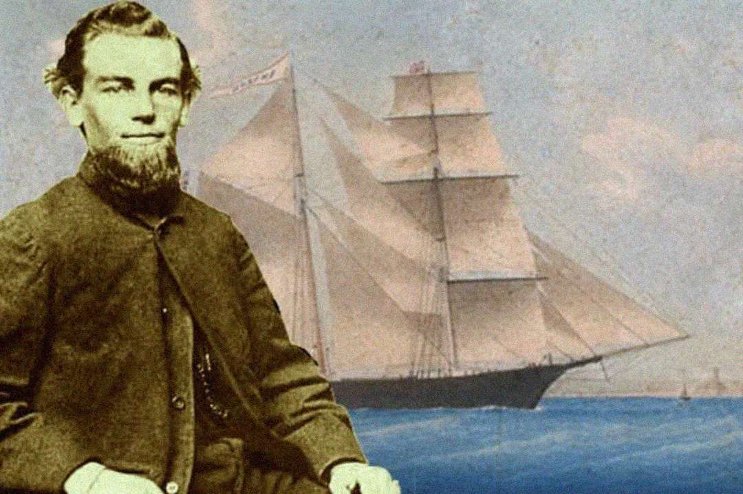 A sepia-toned portrait of a man with a beard, dressed in 19th-century clothing, sits in front of an illustration or painting of a large sailing ship on the ocean under a lightly clouded sky.