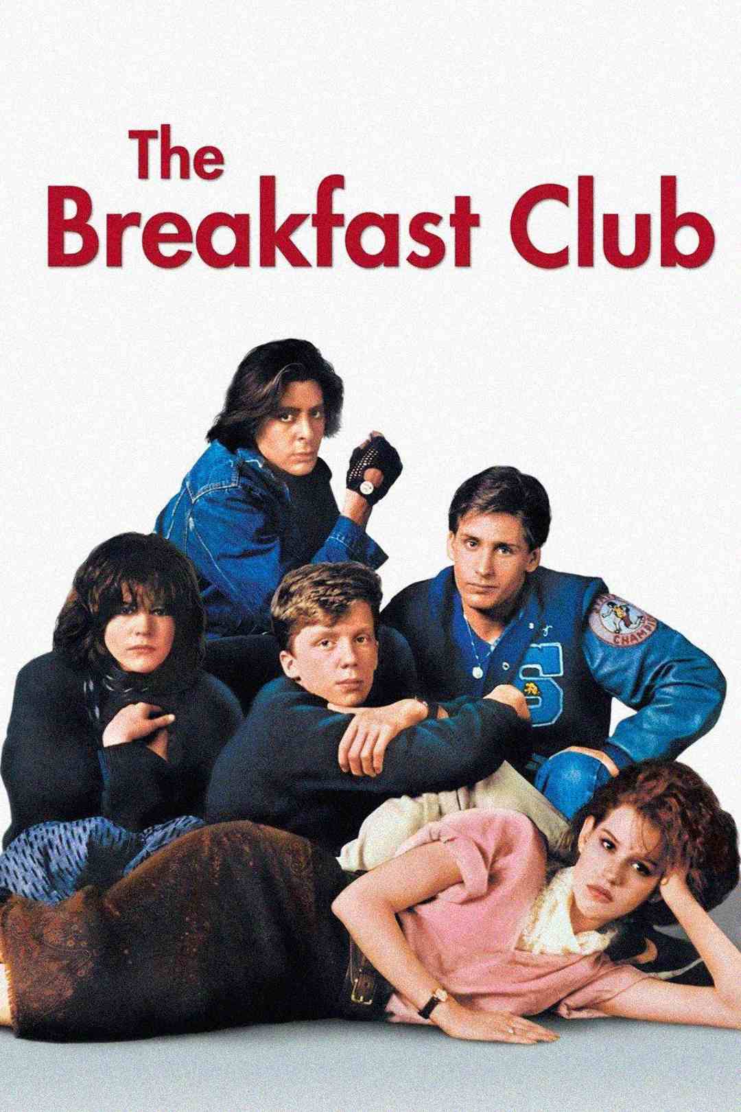 Five teenagers sit and lie close together against a plain background under the title "The Breakfast Club" in bold red letters, each displaying distinct facial expressions and clothing styles.