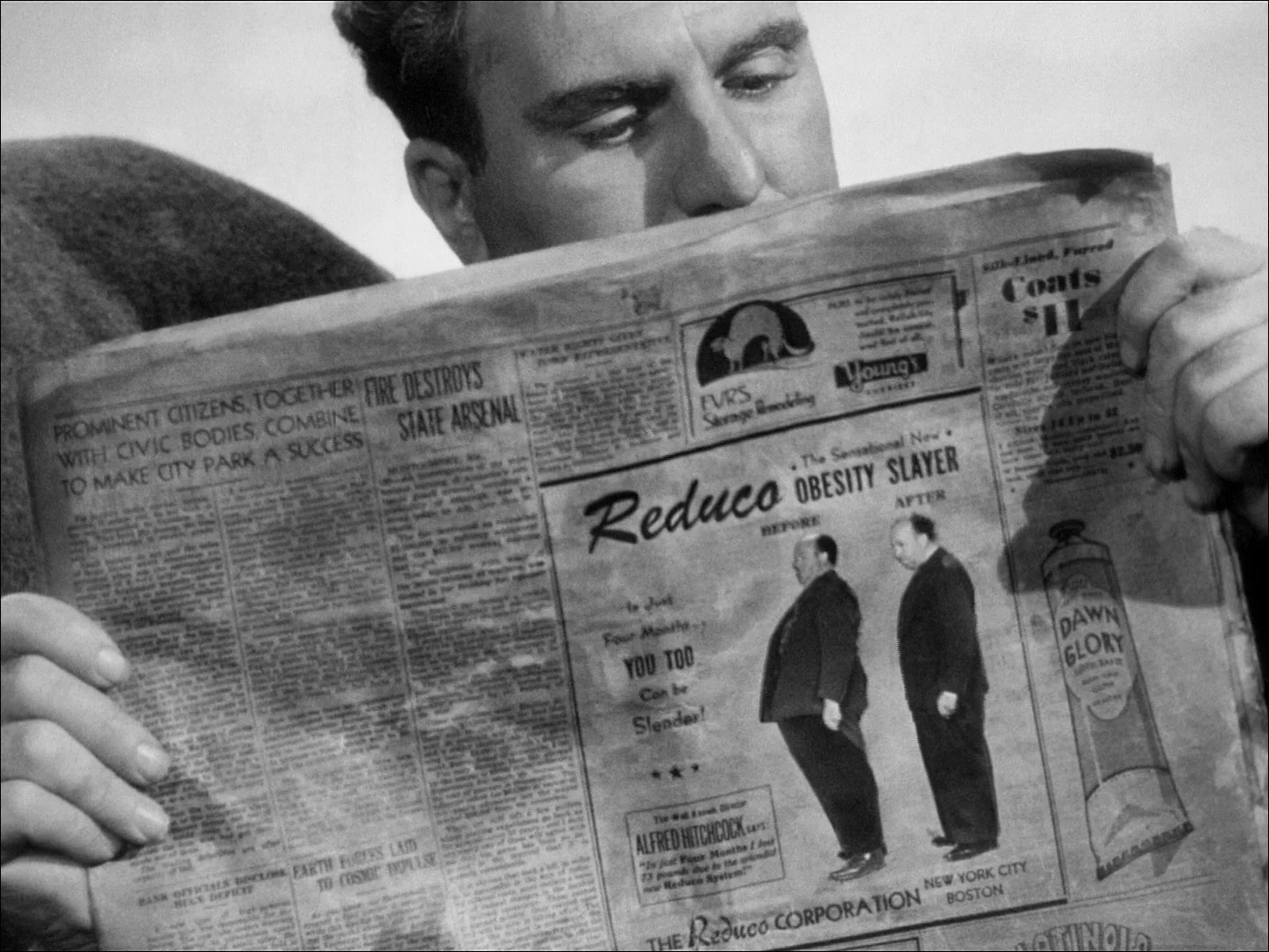 A man closely reads a newspaper with a large advertisement titled "Reduc-O Obesity Slayer," showing before-and-after images of a man who has lost weight. The page also contains articles and other smaller ads.