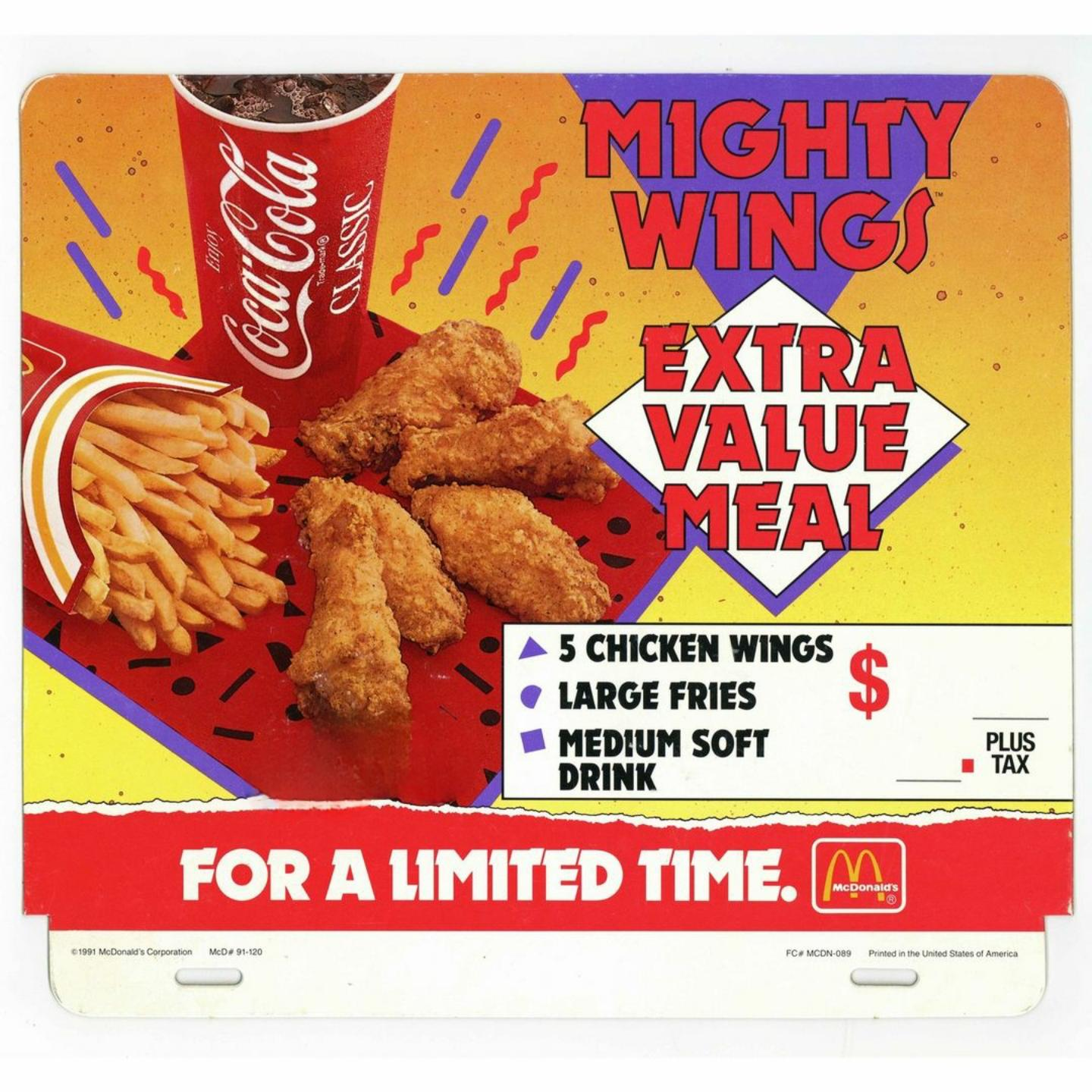 A vintage McDonald's ad for the Mighty Wings Extra Value Meal, showing five chicken wings, a box of fries, and a Coca-Cola. The offer includes wings, large fries, and a medium soft drink, available for a limited time.