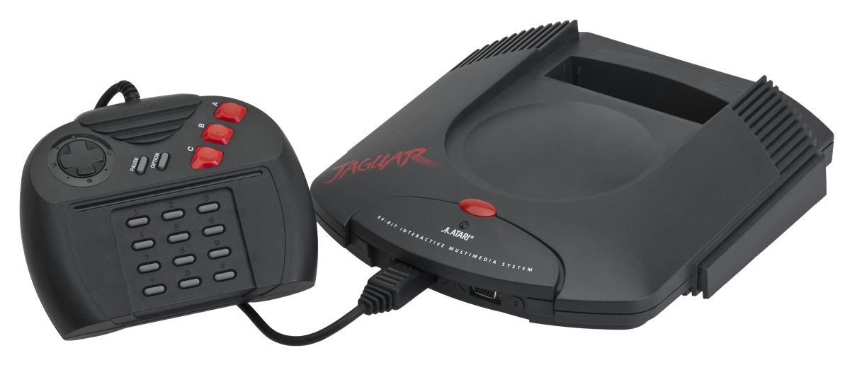 A black Atari Jaguar video game console with a matching controller featuring a number pad and red buttons, both placed on a white background.
