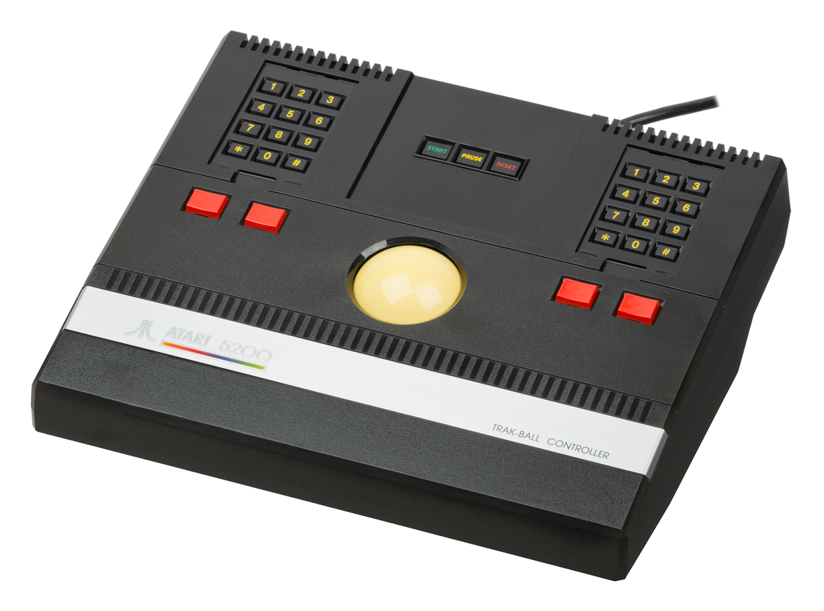 Atari 5200 Trak-Ball controller featuring a large central trackball, numeric keypads on both sides, several red buttons, and a black casing with a silver label.