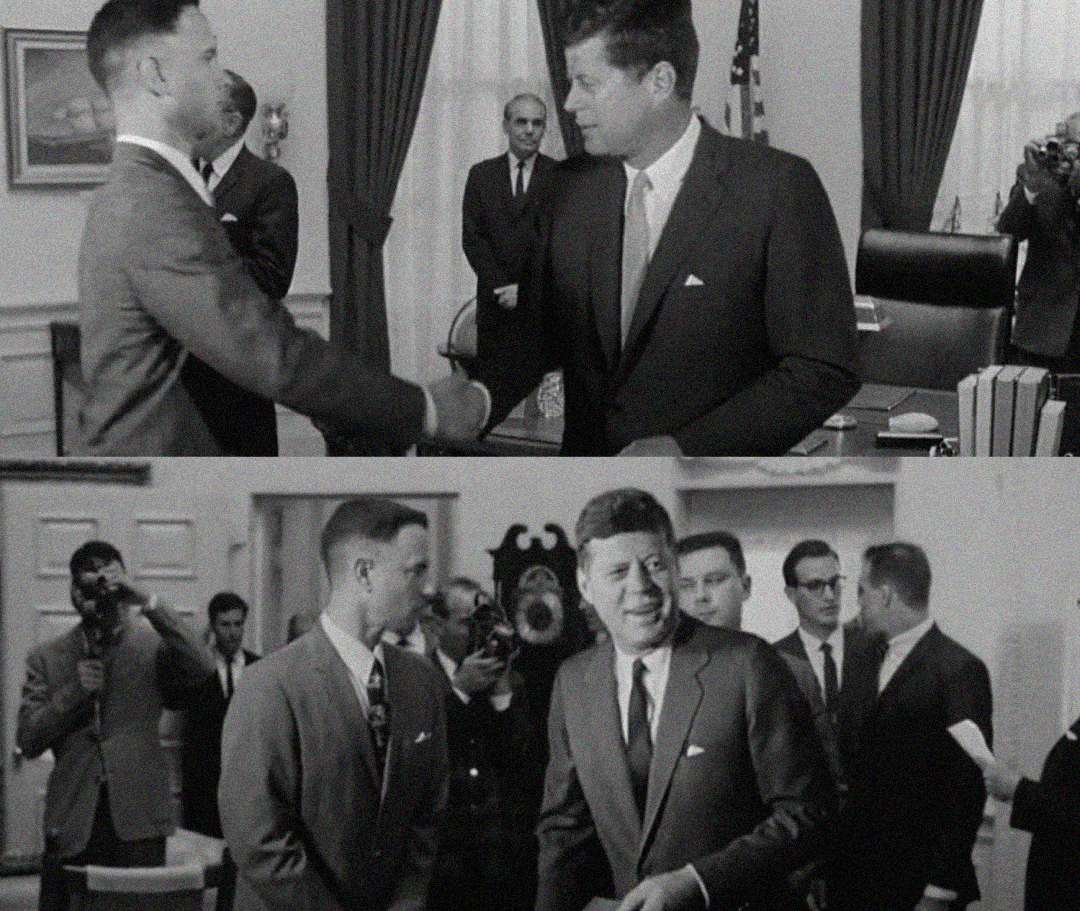 Two black-and-white photos show a man in a suit shaking hands and conversing with President John F. Kennedy in an office setting, surrounded by other men in suits and photographers.