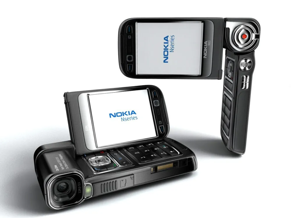 Two black Nokia Nseries mobile phones with swivel screens and exposed keypads are displayed, highlighting their unique rotating camera design. Both screens show the "Nokia Nseries" logo on a white background.