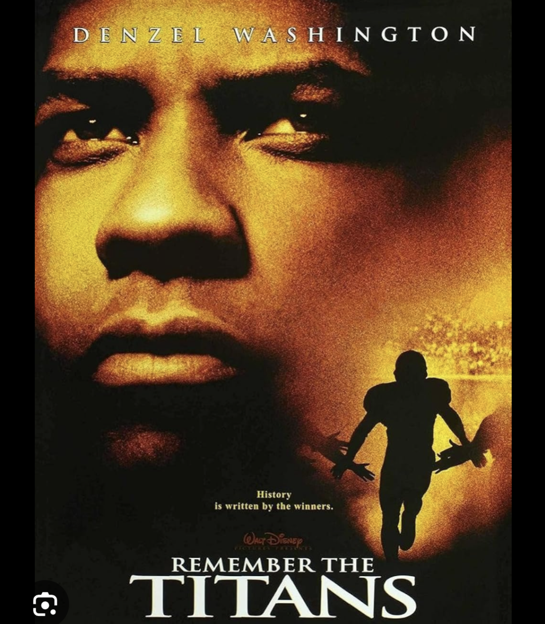 Movie poster for "Remember the Titans" featuring a close-up of a serious man’s face and the silhouette of a football player running on a field, with text "Denzel Washington" at the top and the film title at the bottom.