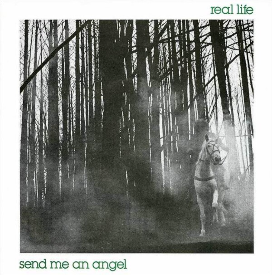 Black-and-white image of a person riding a white horse through a misty forest of tall, leafless trees. Text reads "real life" at the top right and "send me an angel" at the bottom left.
