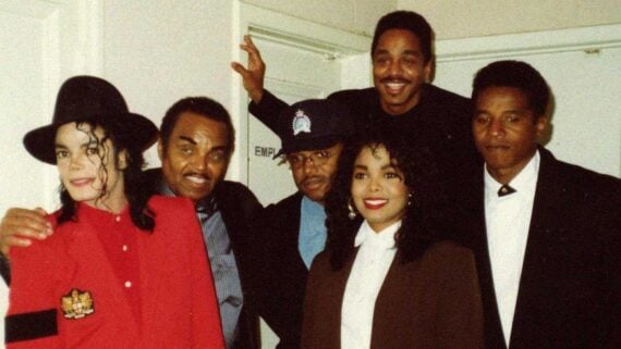 Vintage photo of the Jackson family posing together during the height of their musical success.