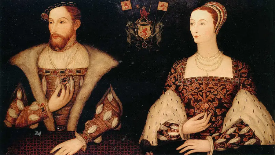 A Renaissance-era painting of a man and a woman in elaborate, fur-trimmed clothing, both holding one hand to their chest, with a coat of arms featuring a red lion above them on a dark background.
