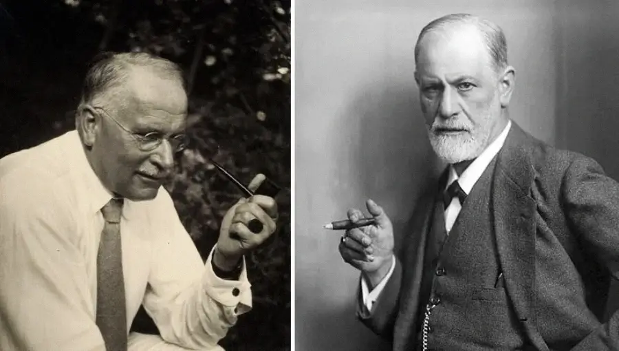 Split image of two older men with glasses and facial hair; the man on the left wears a light shirt and holds a pipe, while the man on the right wears a suit and holds a cigar. Both face the camera.