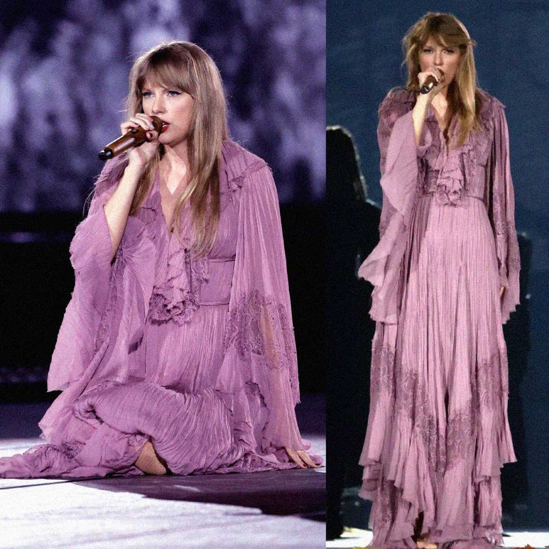 A woman with long, blonde hair sings into a microphone while wearing a flowing, mauve-purple ruffled dress; she is shown sitting on stage and standing under dramatic lighting.