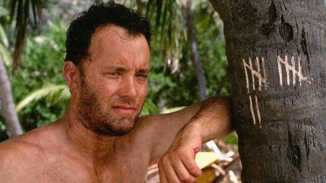 A disheveled man with a beard leans against a tree in a tropical setting, looking troubled. Tallies are carved into the tree trunk beside him, marking time passed.
