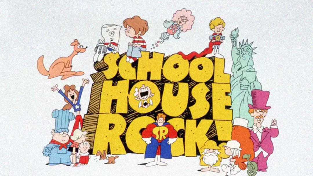 Cartoon characters stand around and on top of the large yellow words “School House Rock!” against a white background. Iconic figures like the Statue of Liberty and various colorful animated characters are featured.