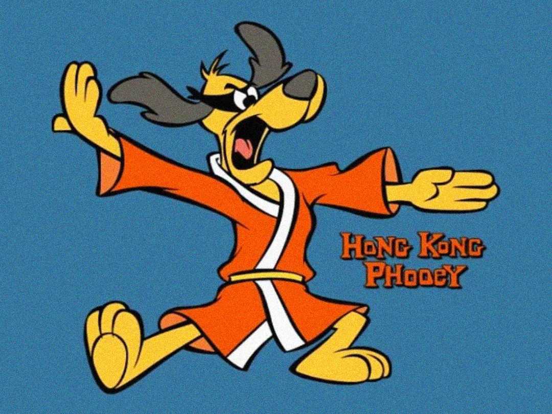 Cartoon dog wearing an orange karate outfit and black mask, striking a martial arts pose on a blue background with the text "Hong Kong Phooey.