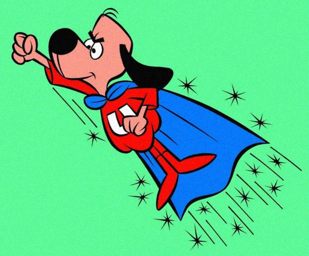 Cartoon superhero dog in a red suit, blue cape, and red boots flies upward with one paw raised on a green background with black starburst lines showing motion.