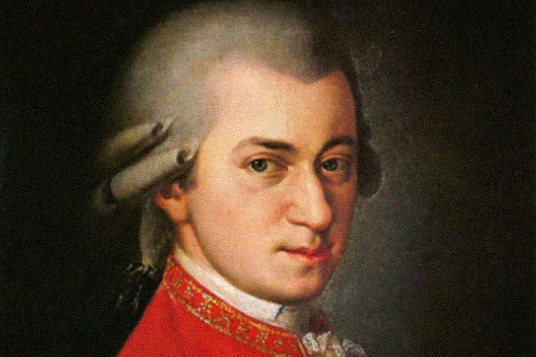 A painted portrait of a young man with powdered white hair, dressed in an ornate red coat with white accents, set against a dark background.