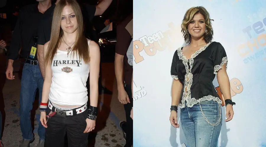 Two women are pictured side by side. The left woman wears a white tank top and black pants with straight hair. The right woman wears a black decorative blouse and jeans, with wavy hair, standing in front of a step-and-repeat backdrop.