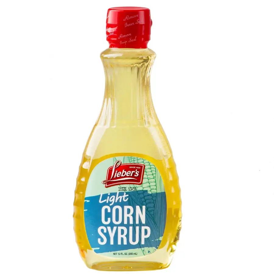 A plastic bottle of Lieber's Light Corn Syrup with a red cap and a blue label, containing yellow syrup. The label features corn graphics and product details.