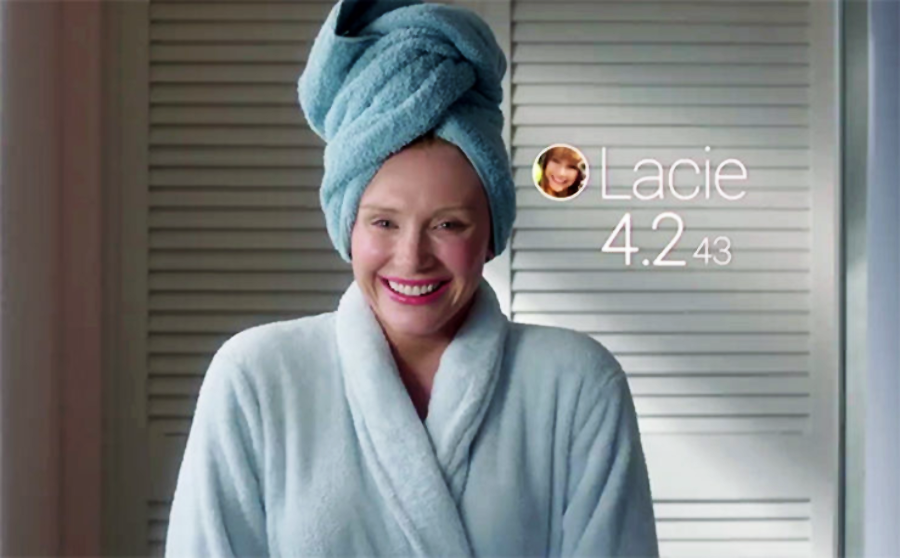 A woman in a white bathrobe and blue towel turban smiles in front of white shutters. Beside her, digital text shows a profile picture, the name "Lacie," and a rating of 4.2.