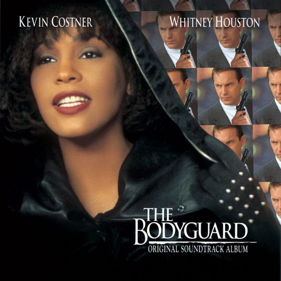 Album cover for "The Bodyguard" soundtrack featuring Whitney Houston in the foreground, smiling and wearing a hood, with repeated images of Kevin Costner holding a gun in the background. Text includes their names and the album title.