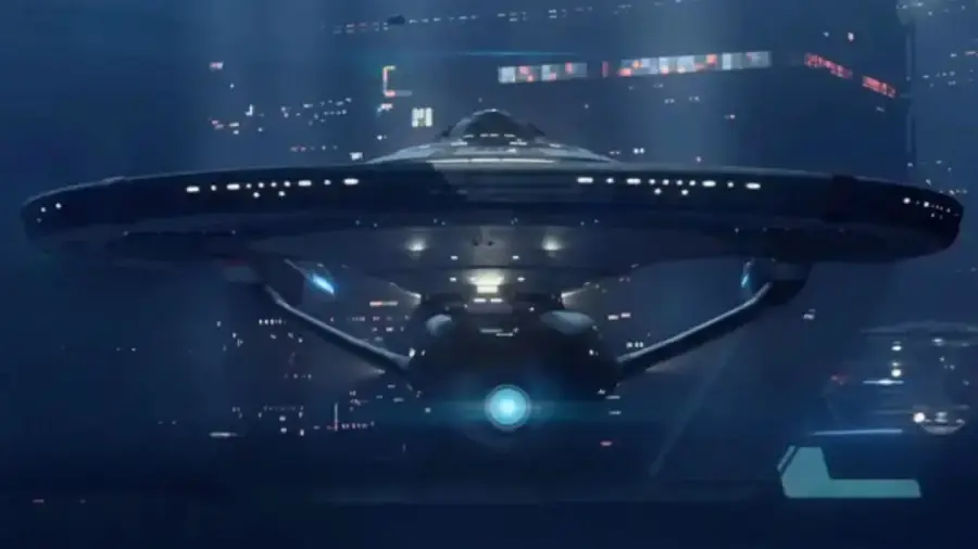 A futuristic spaceship with a saucer-shaped design and glowing blue lights hovers in a dark, high-tech cityscape filled with illuminated skyscrapers and buildings.