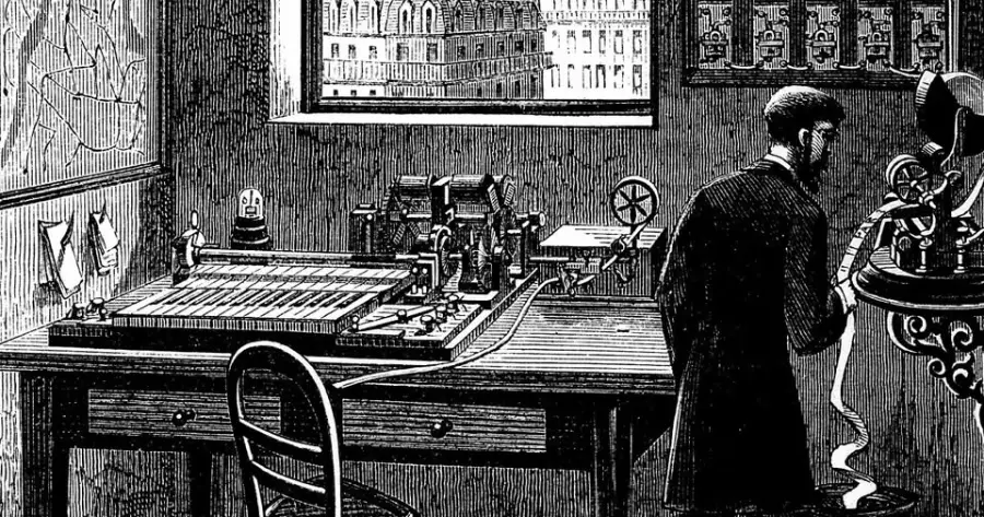 Black and white illustration of a man in old-fashioned attire operating a telegraph machine at a desk in a room, with machinery, maps, and buildings visible through a window.