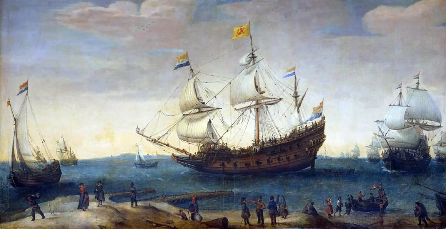 A painting of several large 17th-century sailing ships with multiple masts and flags on the sea, near a busy shoreline where people are gathered and working. The sky is cloudy and the water appears slightly choppy.