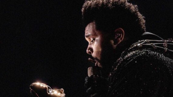 The Weeknd performing during a live appearance, one of the most successful artists in modern chart history.