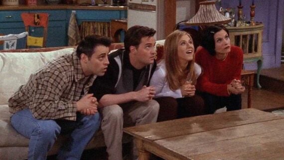 Cast of Friends sitting together, representing one of television's most recognizable theme songs.