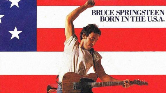 Bruce Springsteen performing on stage during the 1980s at the height of his Born in the U.S.A. success.
