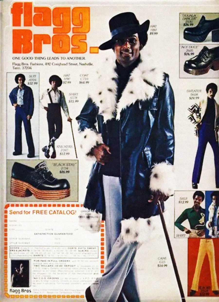 A vintage Flagg Bros. catalog page features a man in a black hat, long blue coat with white fur trim, cane, and platform shoes, surrounded by images of 1970s men’s fashion and footwear with prices and descriptions.
