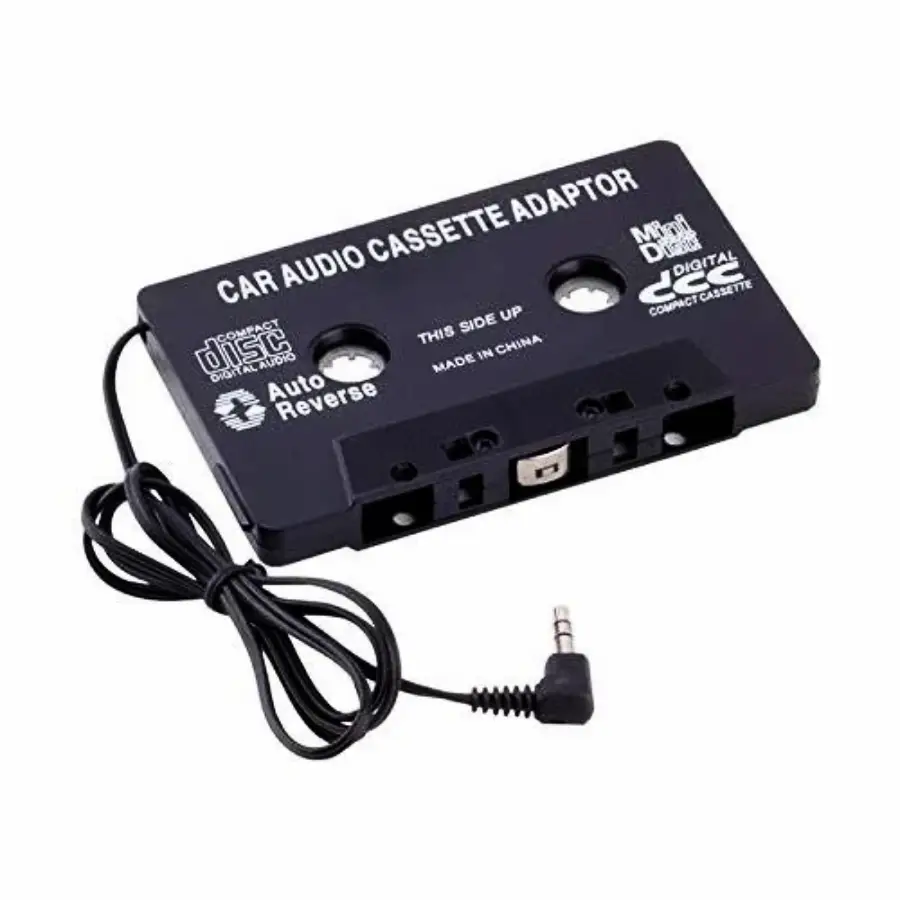 A black car audio cassette adapter with a built-in cable ending in a 3.5mm audio jack, designed to connect digital devices to cassette tape players.