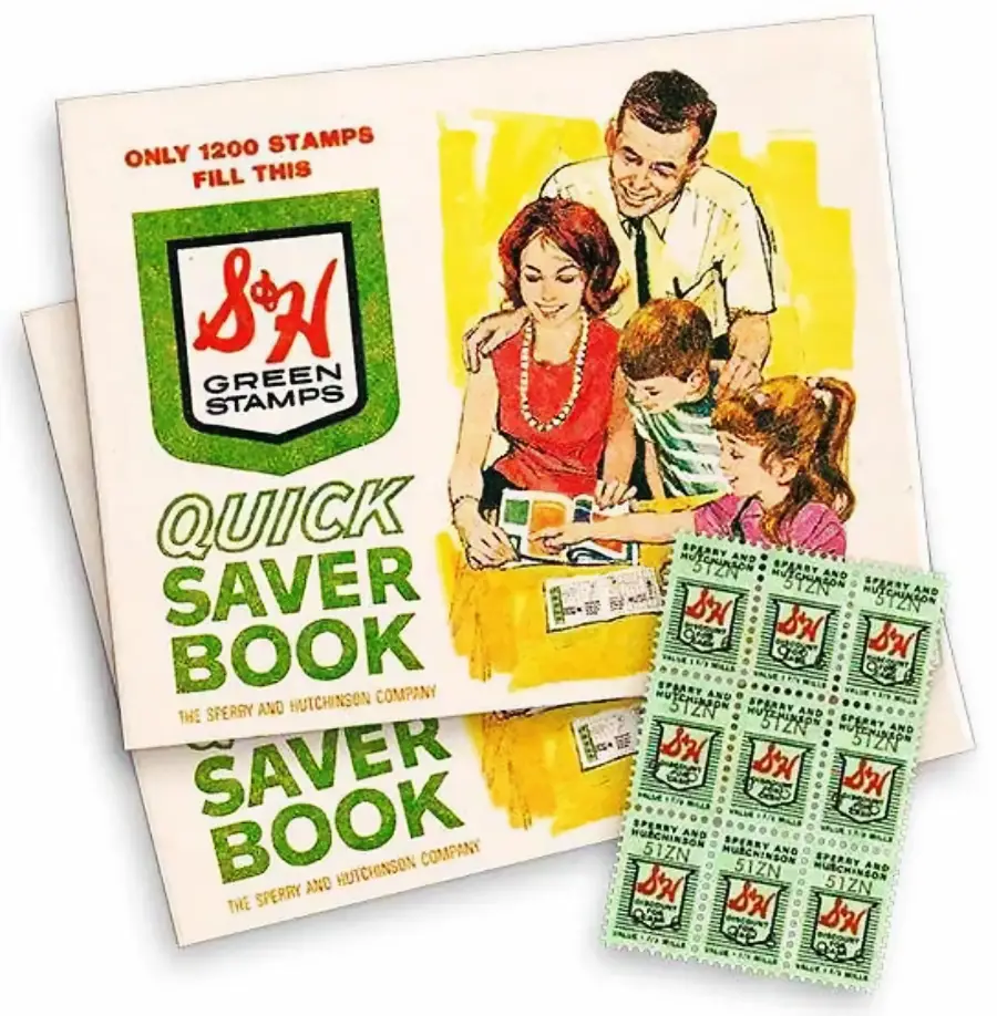 Vintage illustration of a smiling family filling a Green Stamps saver book, with a booklet and a sheet of S&H Green Stamps in the foreground. Text reads “QUICK SAVER BOOK” and “ONLY 1200 STAMPS FILL THIS.”