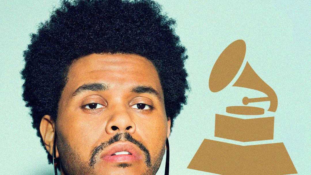A person with curly hair and a mustache stands in front of a light background, next to a gold illustration of a Grammy Award trophy.
