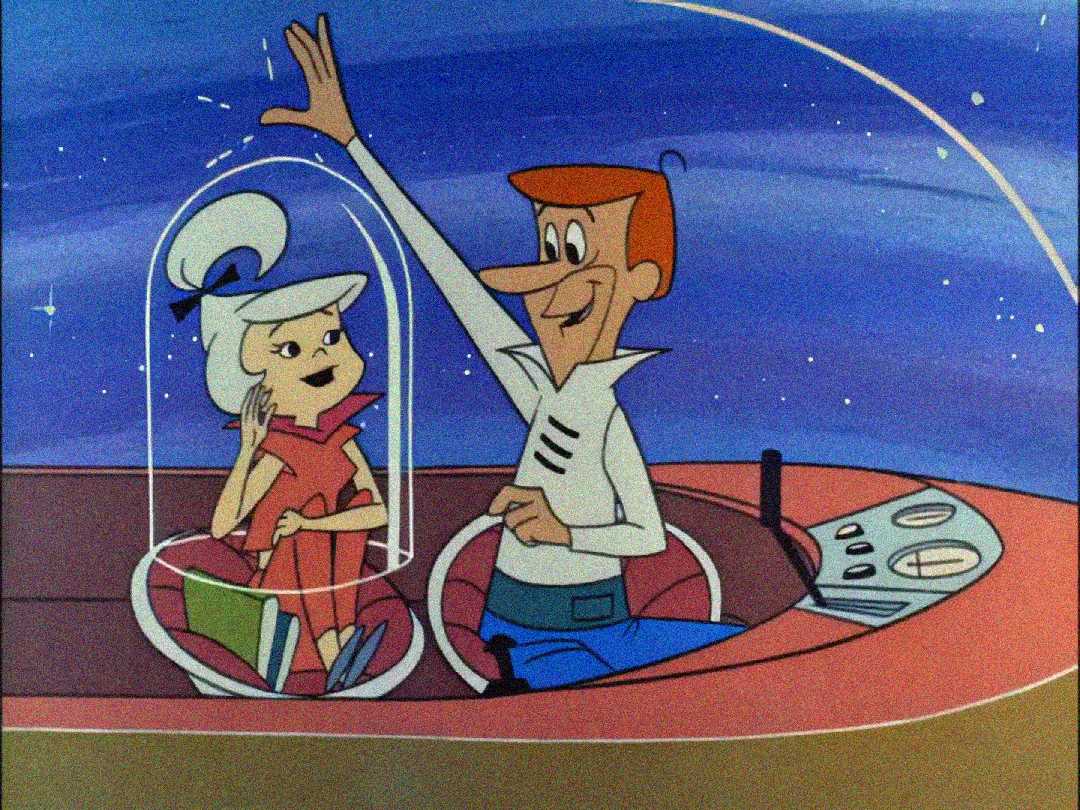 A cartoon man and woman sit in a futuristic flying car with a clear dome. The man waves cheerfully while the woman, wearing a bow in her hair, smiles. The background shows a starry sky.