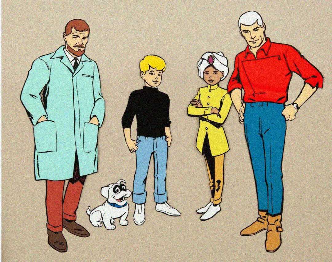 Four cartoon characters stand side by side: a man in a lab coat, a boy in a black turtleneck and jeans, a boy in a yellow tunic with a turban, and a man in a red shirt with boots. A small white dog sits in front.